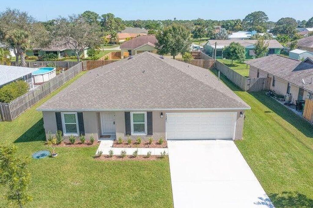 Photo of 1381 SE Bayharbor Street, Port Saint Lucie, FL 34983 (MLS # R11154070)