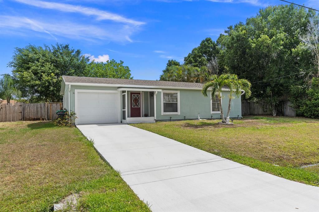 Photo of 1349 SW Gastador Avenue, Port Saint Lucie, FL 34953 (MLS # R10738266)