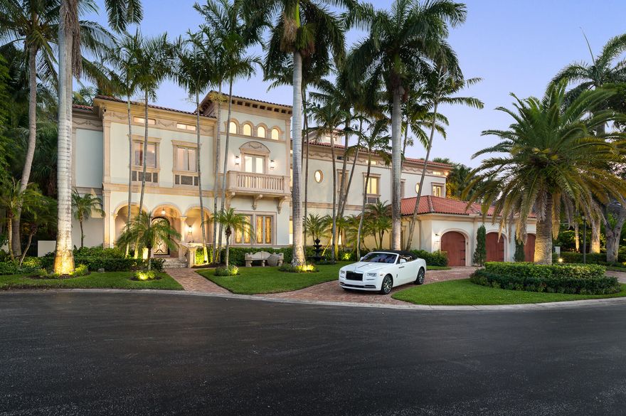 One of the Sanctuary's finest estates situated on 1 1/4 lots & 128 FT of deep water frontage
yacht/toy dockage on extra wide canal. 5BED residence expands over 13,564SF. California Contemporary Design
transcends a cohesive blend of timeless architecture w/ modern elements. Sleek resort style amenities-2,000SF master suite, 4 additional en suite XL bedrooms,gym, screening room, office, zoom room, expansive covered outdoor space & pool, outdoor chef's kitchen, premium elevator, XL dining room, custom bar, wine
room, 3 gas fireplaces. One of largest luxury kitchens in South Florida- endless custom wood cabinets, white quartz countertops, backsplash, luxury appliances,
butler's pantry.