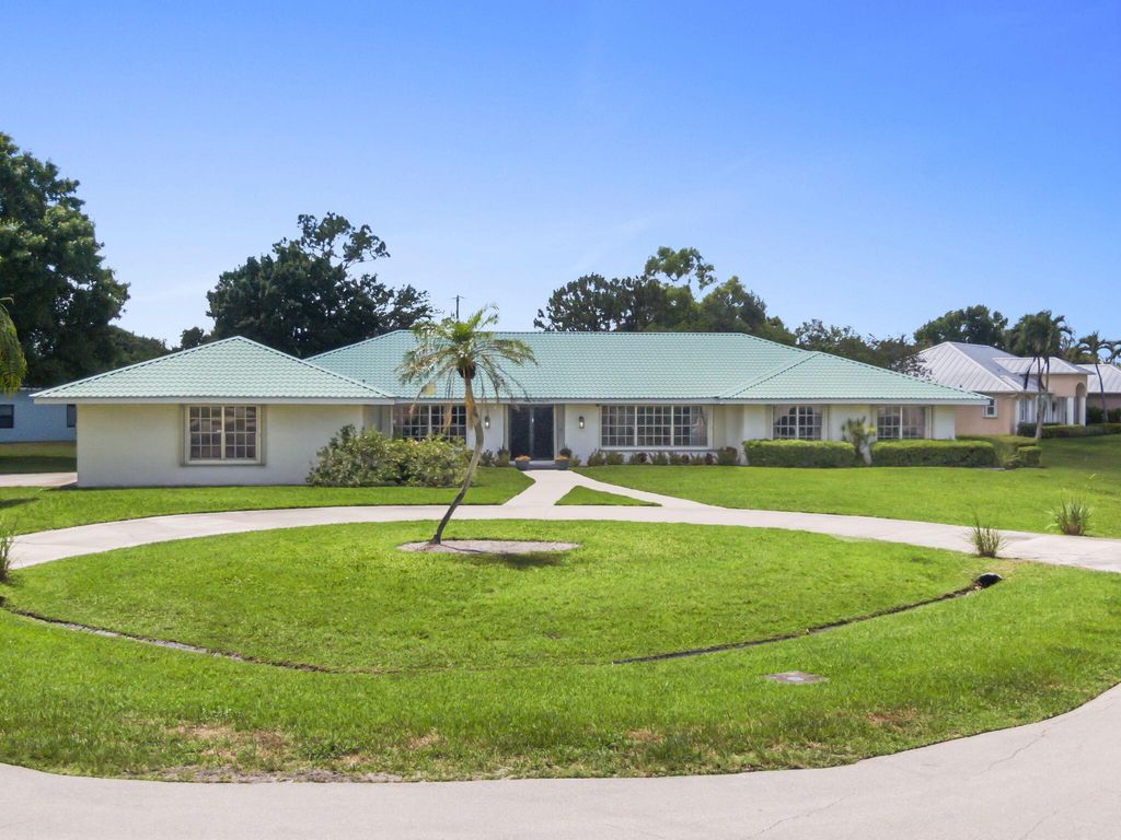 Photo of 2196 SE Flanders Road, Port Saint Lucie, FL 34952 (MLS # R11090851)