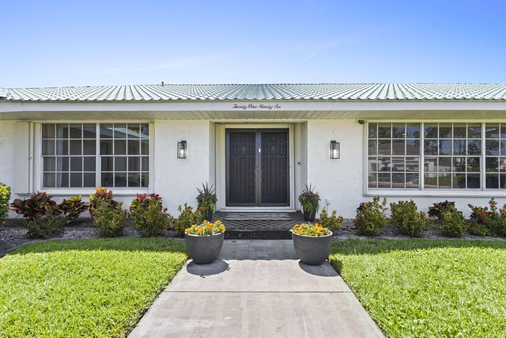 Photo of 2196 SE Flanders Road, Port Saint Lucie, FL 34952 (MLS # R11090851)