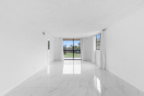 Tiny photo for 2440 DEER CREEK COUNTRY CLUB Boulevard #307-C, Deerfield Beach, FL 33442 (MLS # B26083298)