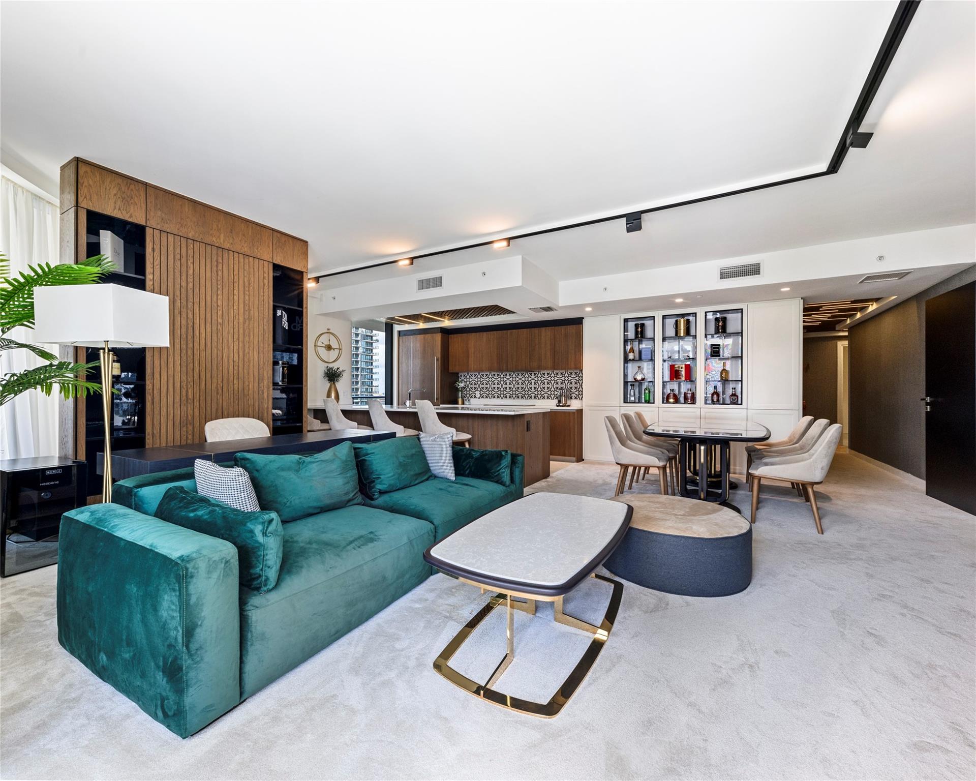 This beautifully upgraded residence is fully customized with designer lighting, elegant wallpapers, and stylish, high-end furniture.
A truly rare offering, the coveted 01 line stands apart from every other line in the building with its unique layout and unparalleled view. While neighboring units have lost their views to new construction, the 01 line enjoys a permanently unobstructed view.
Residence 1201, though situated on a lower floor, offers a distinctive advantage-its position overlooks the shimmering pool in a way that feels almost like having your own private oasis. The result is a rare blend of privacy, exclusivity, and resort-style living, right at home.