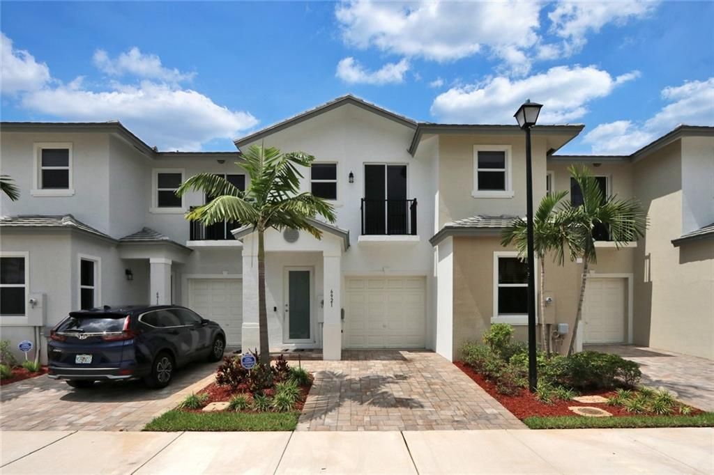 Photo of 6921 PINES CIRCLE Cir, Coconut Creek, FL 33073 (MLS # F10338739)
