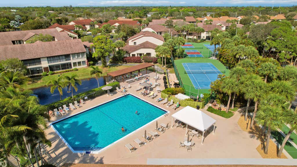 Photo of 3254 Jog Park Drive, Greenacres, FL 33467 (MLS # B26057020)