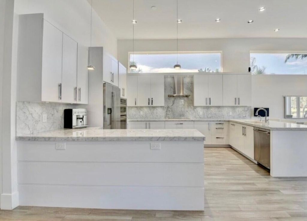 Photo of 5411 NW 42nd Avenue, Boca Raton, FL 33496 (MLS # R11166294)