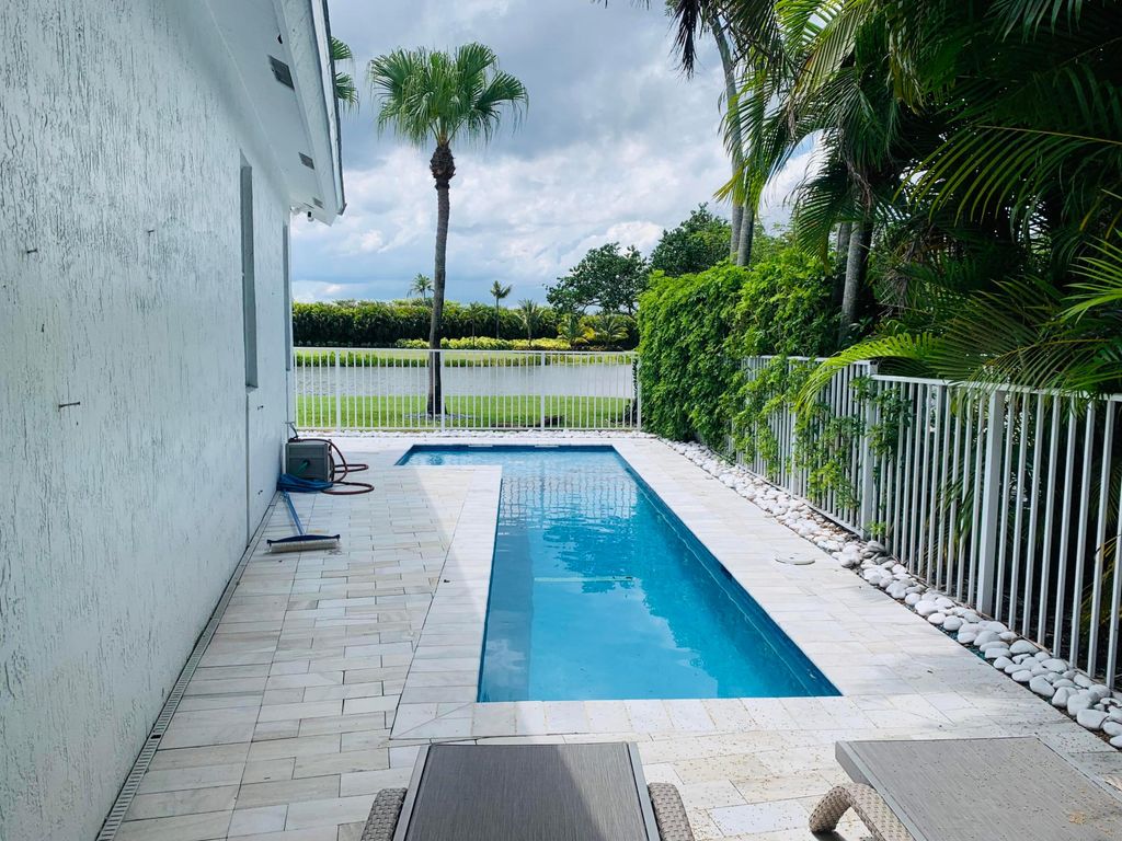 Photo of 5411 NW 42nd Avenue, Boca Raton, FL 33496 (MLS # R11166294)