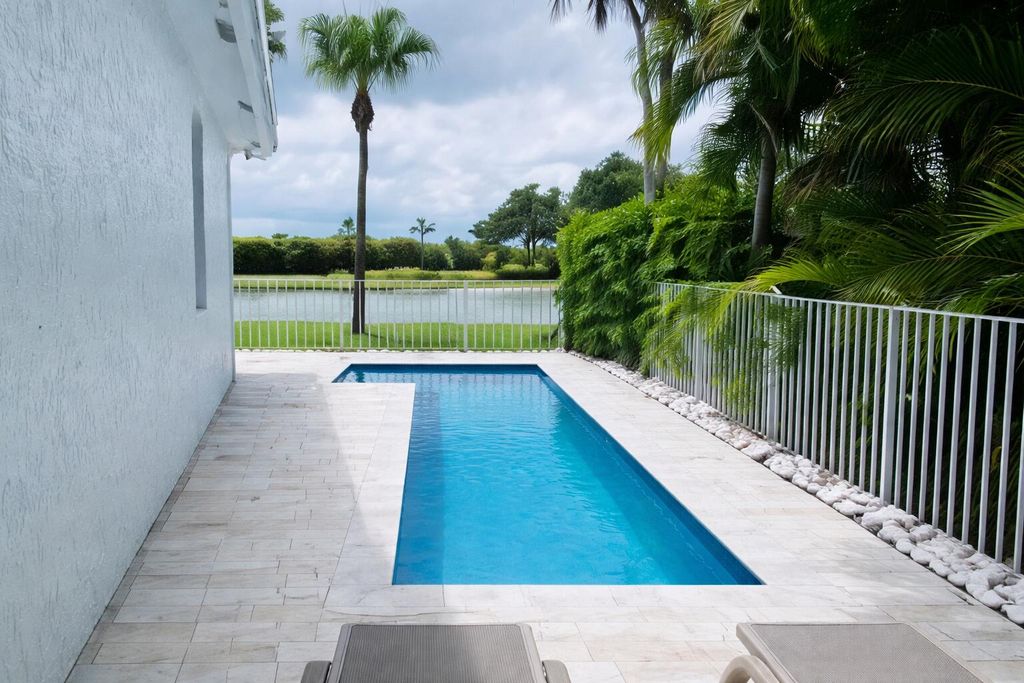 Photo of 5411 NW 42nd Avenue, Boca Raton, FL 33496 (MLS # R11166294)