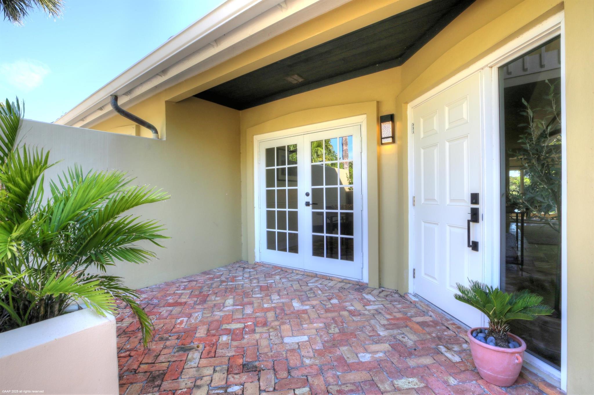 Palm Beach Polo, charming 2-bedroom, 2.1-bath home in Muirfield Court. This lovely residence offers a cozy and inviting living space in a fantastic location near all the equestrian venues that Wellington offers. The spacious garage and full-impact glass are just some of the advantages this property offers, including 24-hour security with manned gates. The Dunes Preserve with 5 miles of trails for biking and walking, plus tennis courts, pickle ball courts and renovated gym.