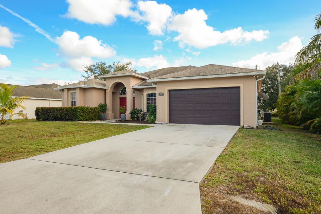 Photo of 554 SW Halden Avenue, Port Saint Lucie, FL 34953 (MLS # R11141556)
