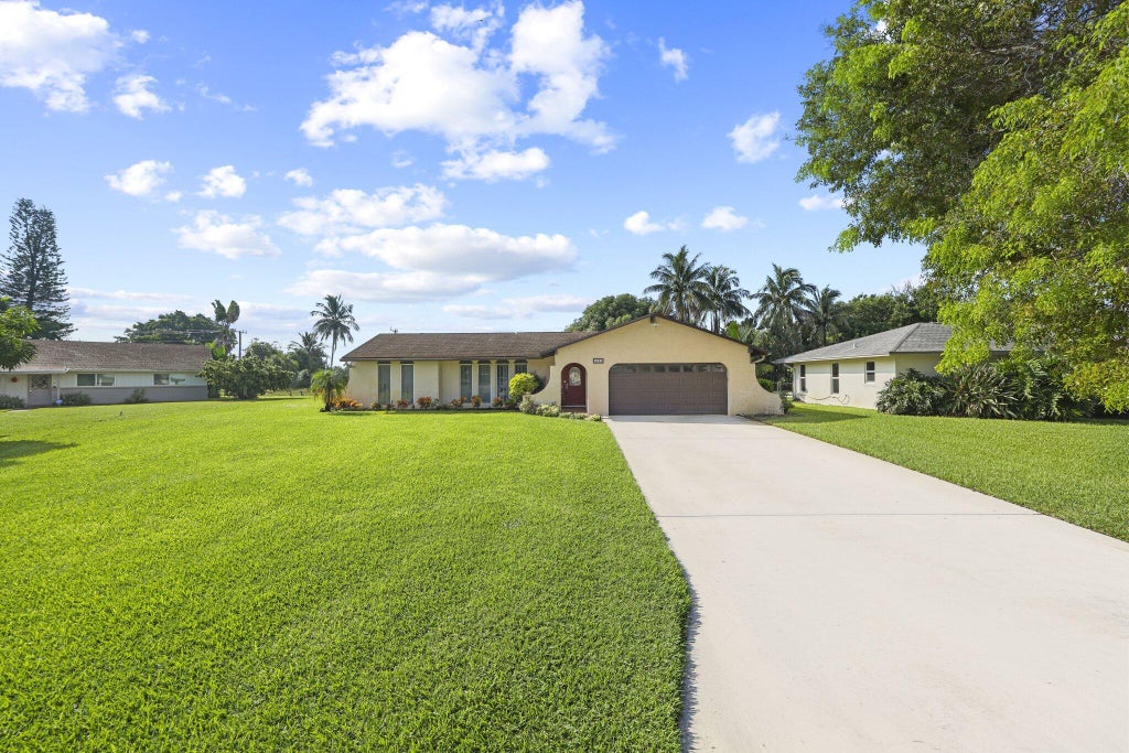 Photo of 4232 Althea Way, Palm Beach Gardens, FL 33410 (MLS # B26087363)