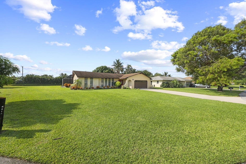 Photo of 4232 Althea Way, Palm Beach Gardens, FL 33410 (MLS # B26087363)