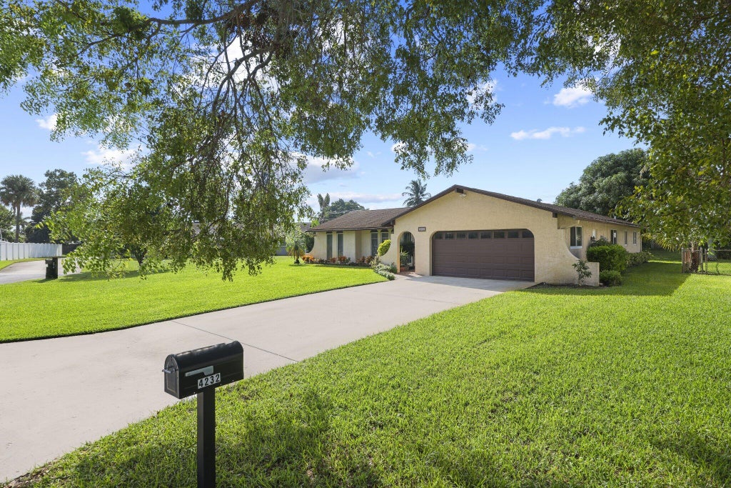 Photo of 4232 Althea Way, Palm Beach Gardens, FL 33410 (MLS # B26087363)