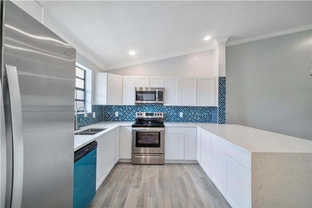 Photo of 1004 Congressional Way, Deerfield Beach, FL 33442 (MLS # B26057069)