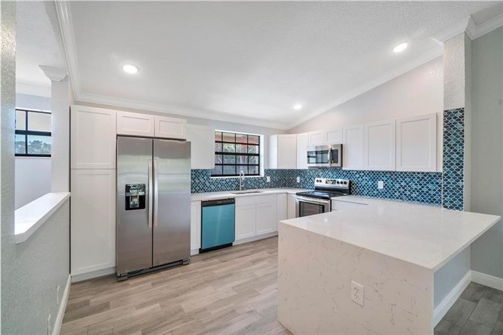 Photo of 1004 Congressional Way, Deerfield Beach, FL 33442 (MLS # B26057069)