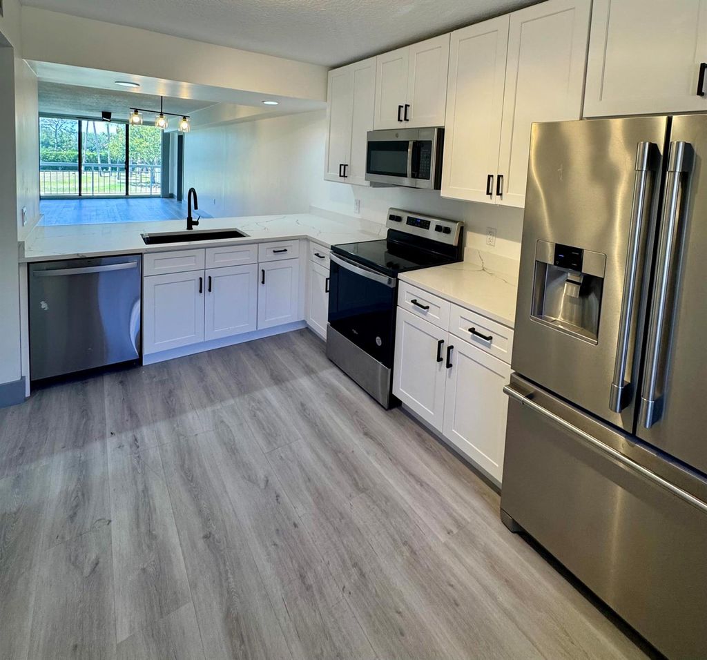 Photo of 2761 Village Boulevard #201, West Palm Beach, FL 33409 (MLS # R11085735)