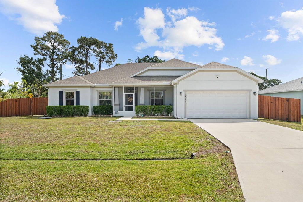 Photo of 1317 SE Odonnell Lane, Port Saint Lucie, FL 34983 (MLS # R11088126)