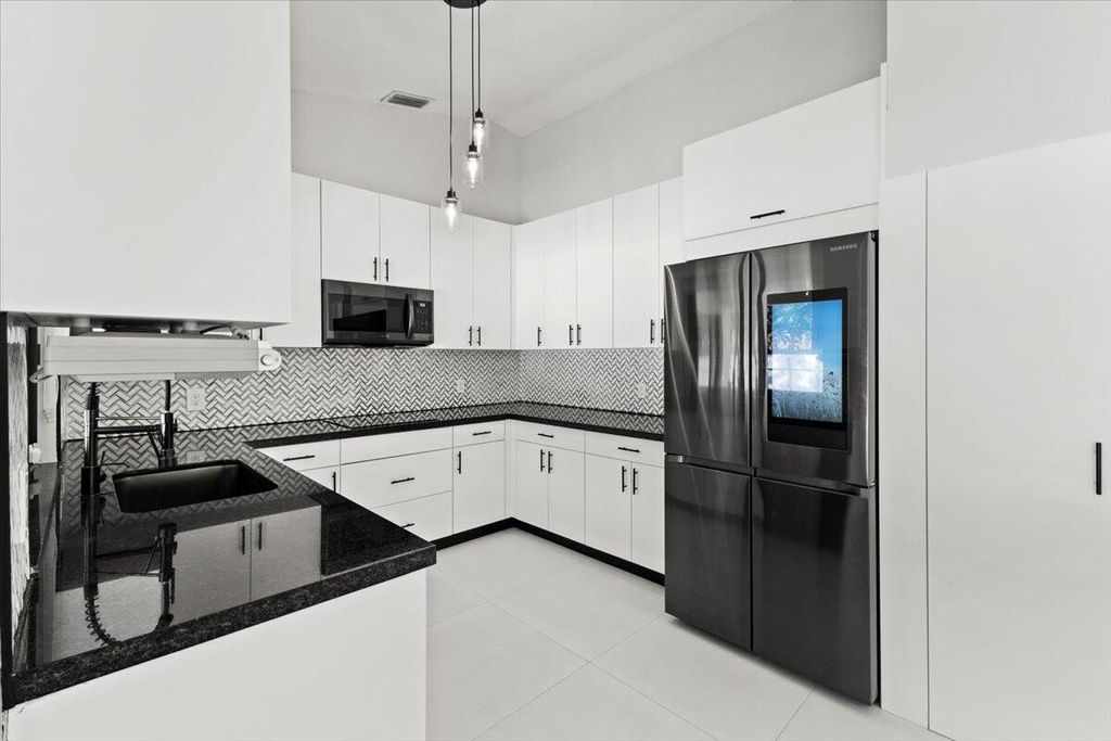 Photo of 20221 NW 8th Street, Pembroke Pines, FL 33029 (MLS # B26019039)