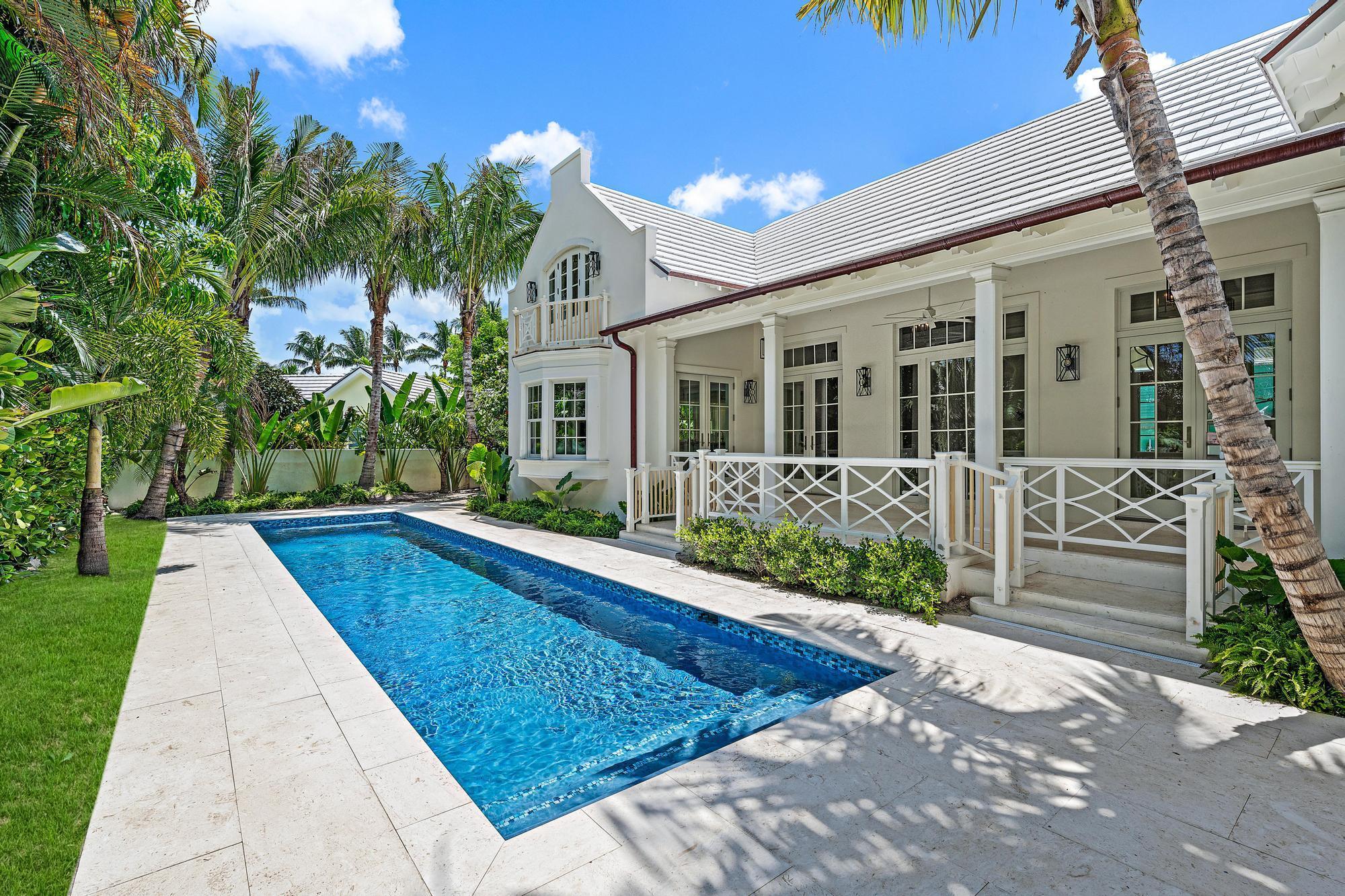Classic architectural detail and design are highlighted throughout this elegant, brand new Palm Beach residence located just steps from the desirable lake trail. The light-filled great room, with soaring ceilings and a cozy fireplace, anchors the home which is complemented by a gracious primary suite and beautifully designed ensuite bath, three additional guest suites providing privacy for family and guests, and a dedicated home office. Outdoors, the lush landscaping surrounds the sparkling lap pool and relaxation space. Designed by Richard Sammons of Fairfax & Sammons and built by Patrick Marrano, a premier builder in Palm Beach and Western New York, the home reflects timeless elegance and masterful proportions. Completion is anticipated in time to be fully enjoyed by the 2025-26 season.