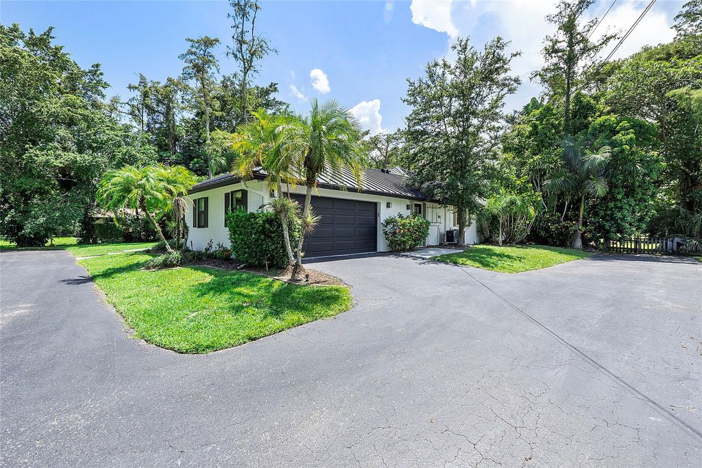 Photo of 6027 NW 77th Terrace, Parkland, FL 33067 (MLS # F10451487)