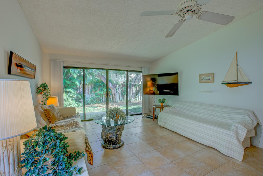 Photo of 1092 Raintree Court, Palm Beach Gardens, FL 33410 (MLS # B26086410)