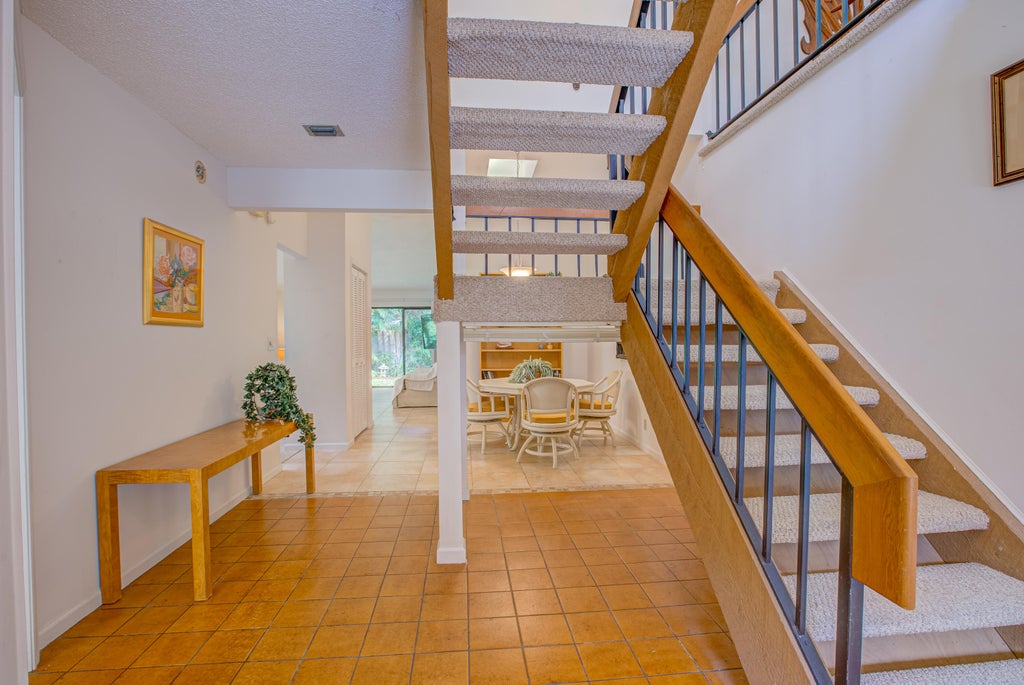 Photo of 1092 Raintree Court, Palm Beach Gardens, FL 33410 (MLS # B26086410)