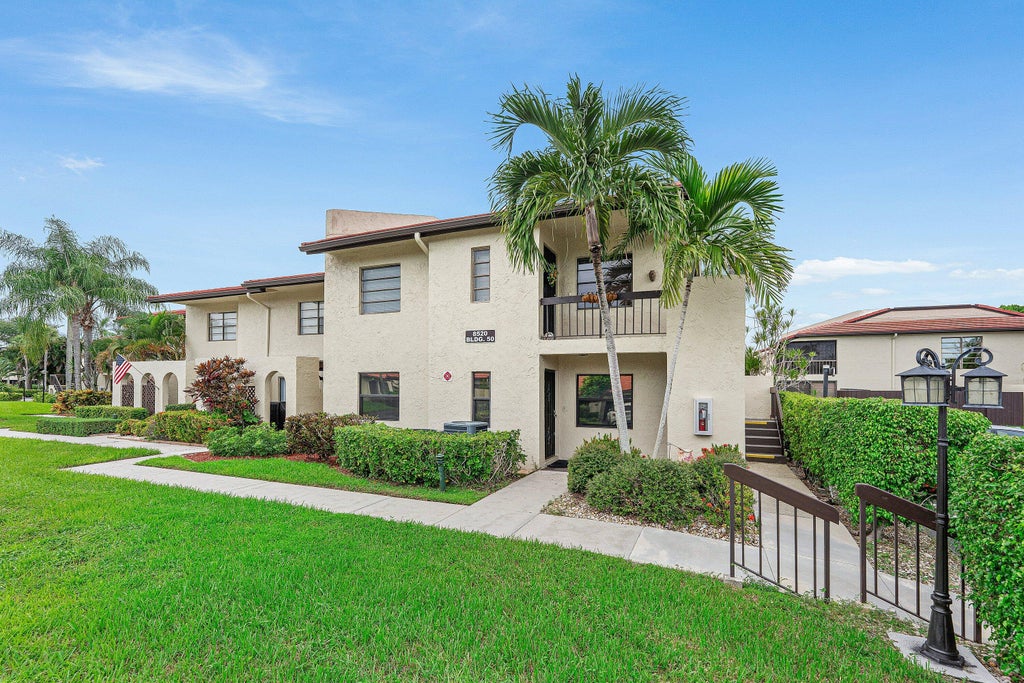 Photo of 8520 CASA DEL LAGO #E, Boca Raton, FL 33433 (MLS # B26075815)