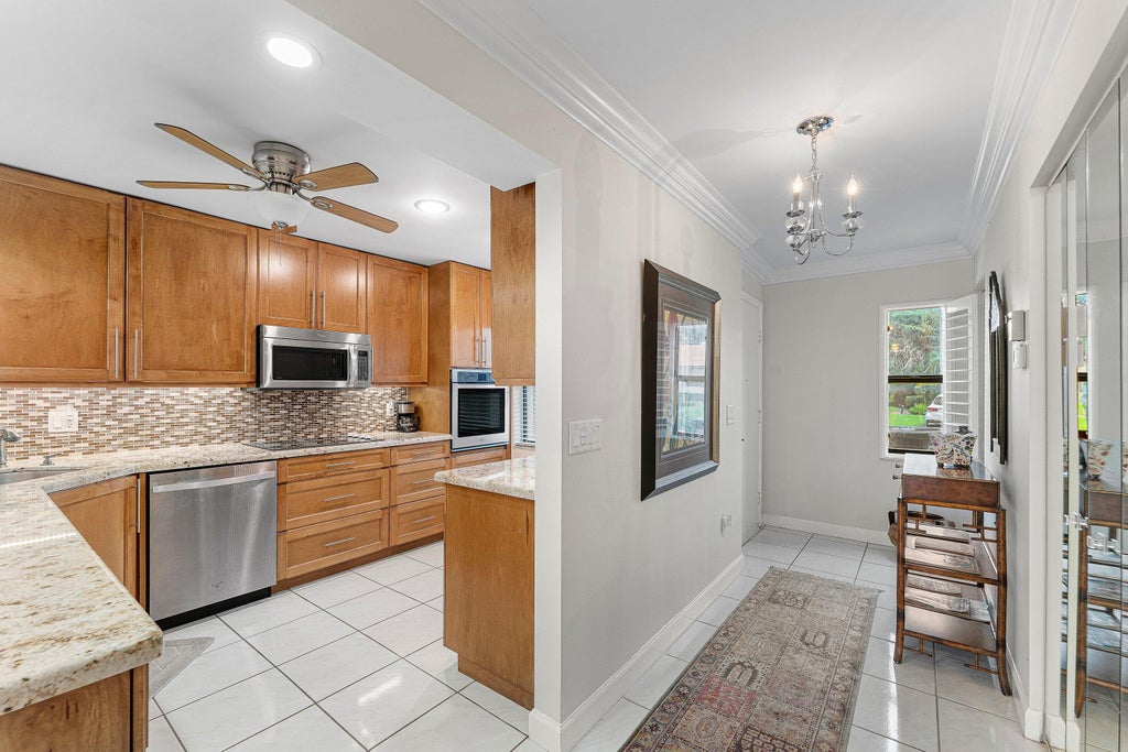 Photo of 8520 CASA DEL LAGO #E, Boca Raton, FL 33433 (MLS # B26075815)
