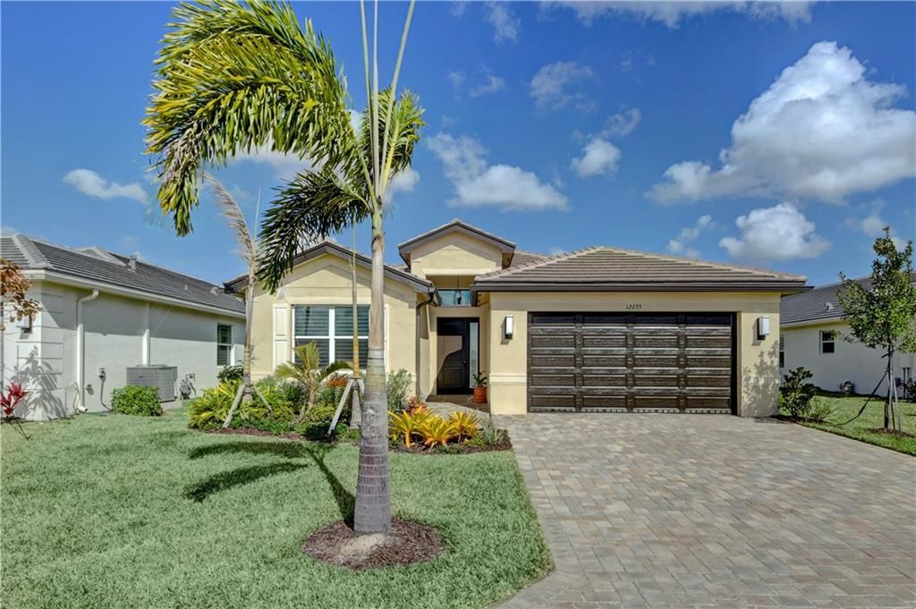 Photo of 12235 SW Sandpiper Way, Port Saint Lucie, FL 34987 (MLS # F10316778)