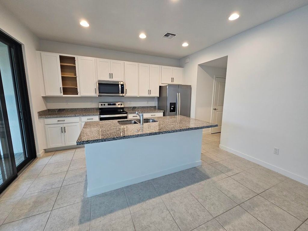 Photo of 8641 Antarus Drive, Lake Worth, FL 33467 (MLS # B26028742)