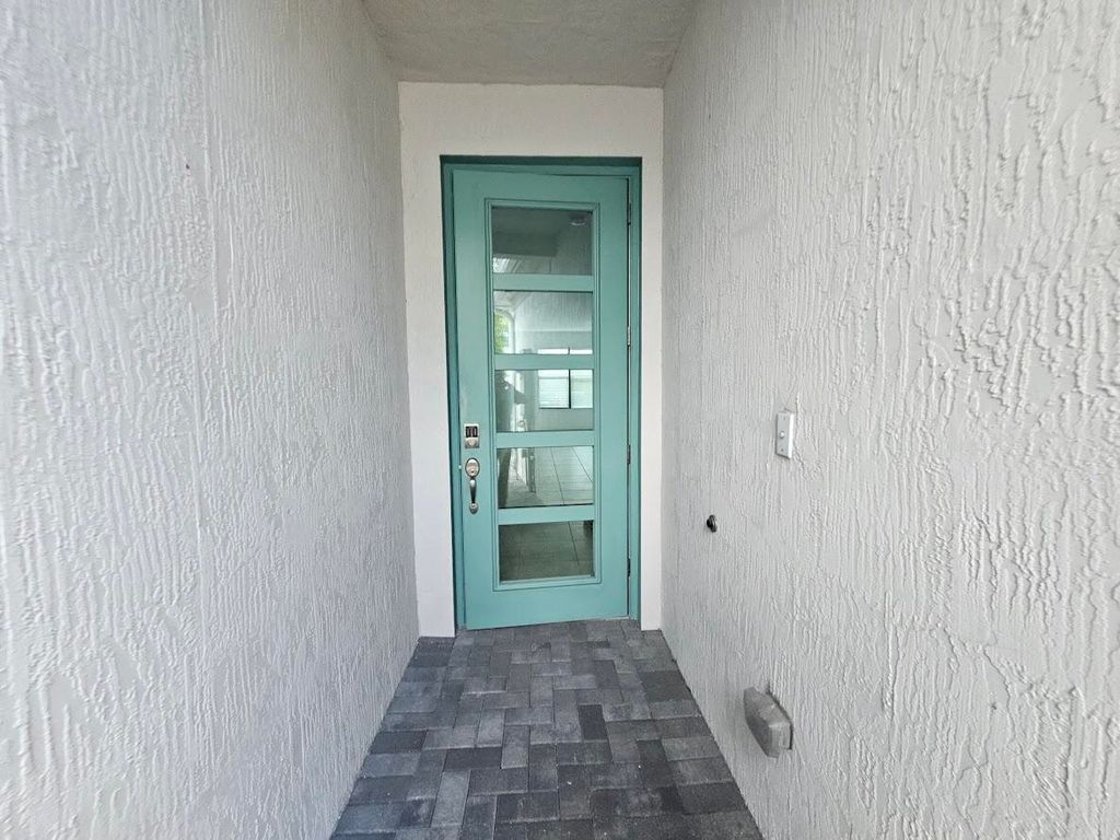Photo of 8641 Antarus Drive, Lake Worth, FL 33467 (MLS # B26028742)