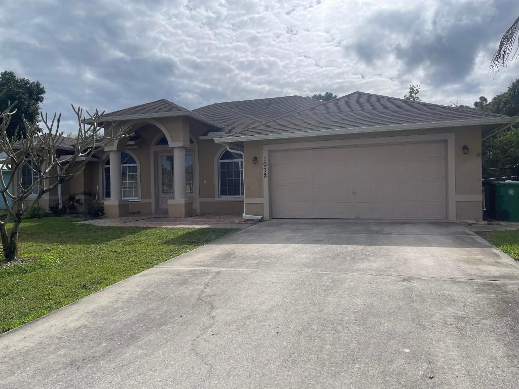 Photo of 1072 SW Castaneda Lane, Port Saint Lucie, FL 34953 (MLS # R10944999)