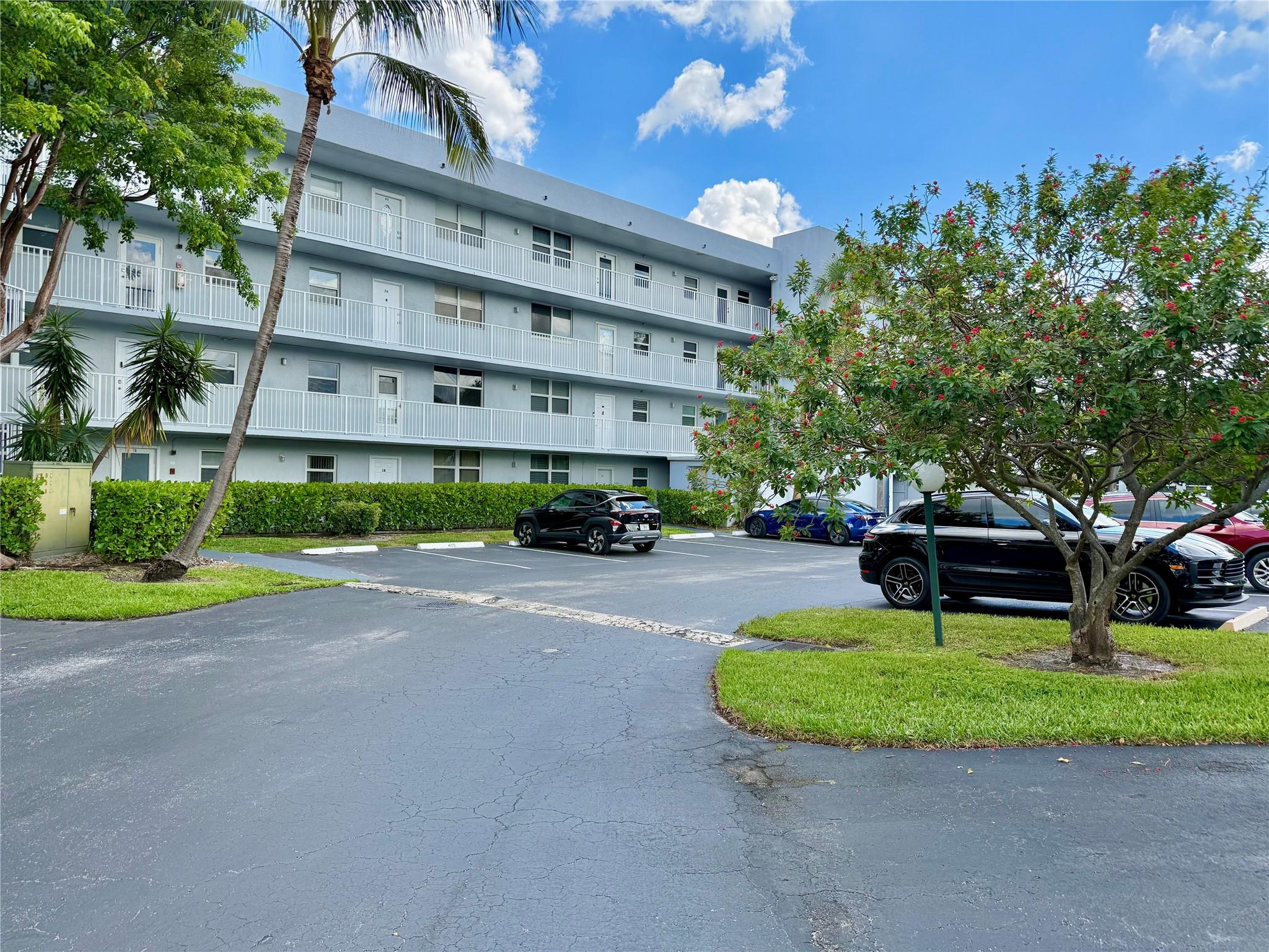 Beautiful, updated 2/2 corner unit with pool views. This 3rd floor corner condo features an updated kitchen with granite countertops and newer appliances, impact windows and doors, and roll-down shutters on a screened balcony. Pet-friendly owner and community. The amenities of this guard-gated community include 3 pools, a community room, a clubhouse, a party room, a men's/women's gym, a sauna, a car wash area, and more. Just outside the complex, there are parks, trails, playgrounds, tennis, pickleball, basketball, and fishing lakes. Moments to Fort Lauderdale, Wilton Manors, the beach, and I-95. Rent includes: water, sewer, trash, and basic cable.
