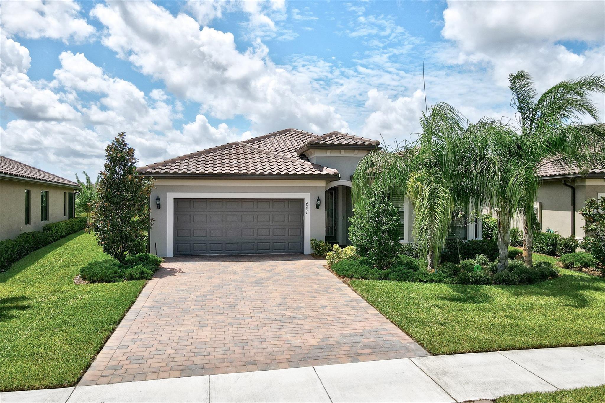 Recently built 2 bed PLUS DEN (easy closet add-on), CBS home with ALL impact wndw/doors. STUNNING kitchen connected to living/dining room looking out to preserve. Home offers 9.5' ceilings, 8' doors, Quartz countertops, plantation shutters & oversized tile throughout. Primary bedroom has preserve views, extended shower, fantastic walk in closet, dual sinks + pocket door for privacy. Kitchen provides ample storage soft close cabinets & a "party pantry, SS appliances + coffee bar. Home provides loads of natural light+ ample overhead lighting. PHENOMENAL amenities!! Close to Grand Harbor
