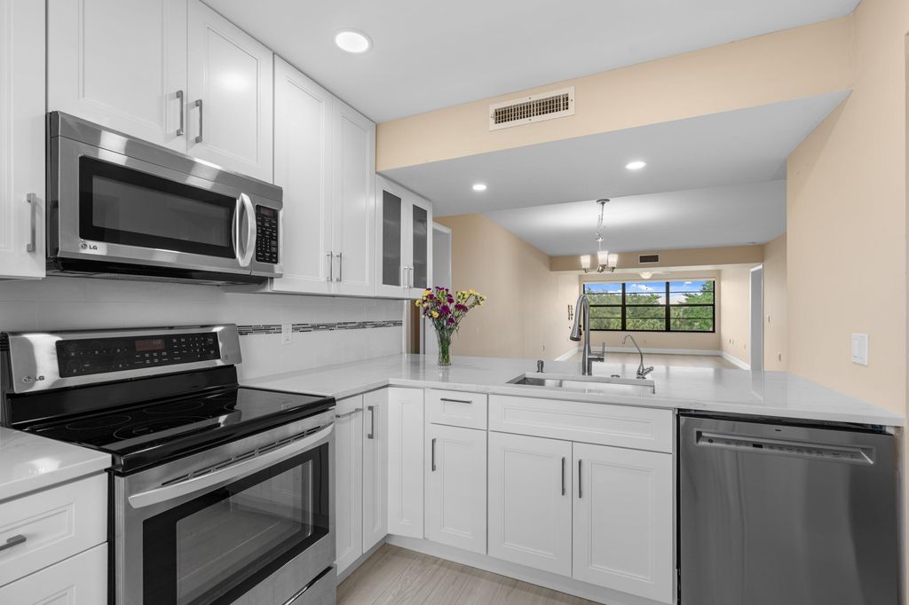 Photo of 6025 Balboa Circle #406, Boca Raton, FL 33433 (MLS # R11131176)