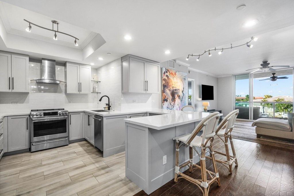 Photo of 2650 Lake Shore Drive #201, Riviera Beach, FL 33404 (MLS # R11136736)