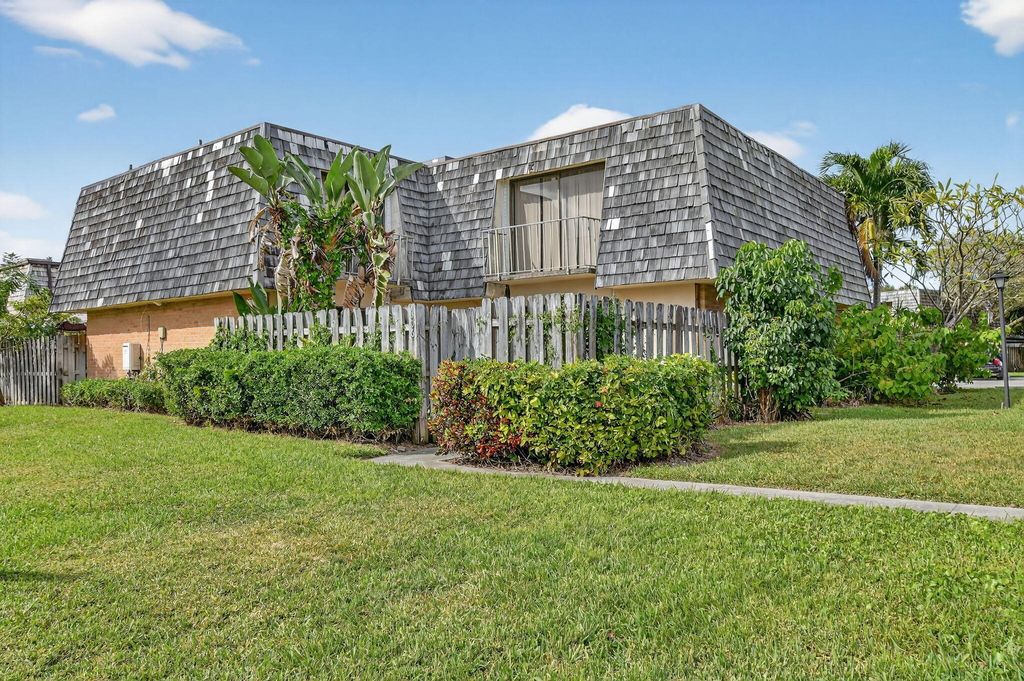Photo of 306 Lake Arbor Drive, Palm Springs, FL 33461 (MLS # R11138720)