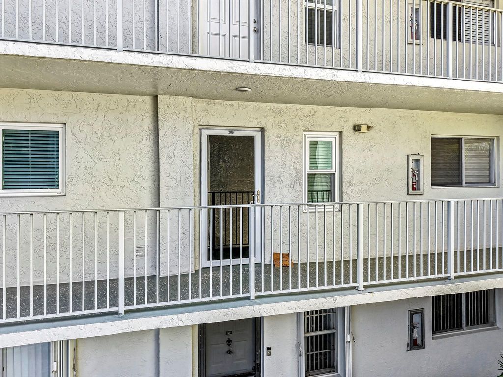 Photo of 2236 N Cypress Bend Drive #206, Pompano Beach, FL 33069 (MLS # F10498505)