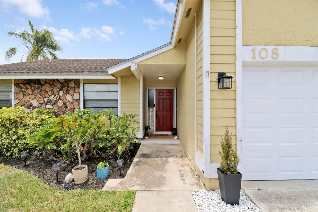 Photo of 108 Greenbriar Drive, Jupiter, FL 33458 (MLS # R11104757)