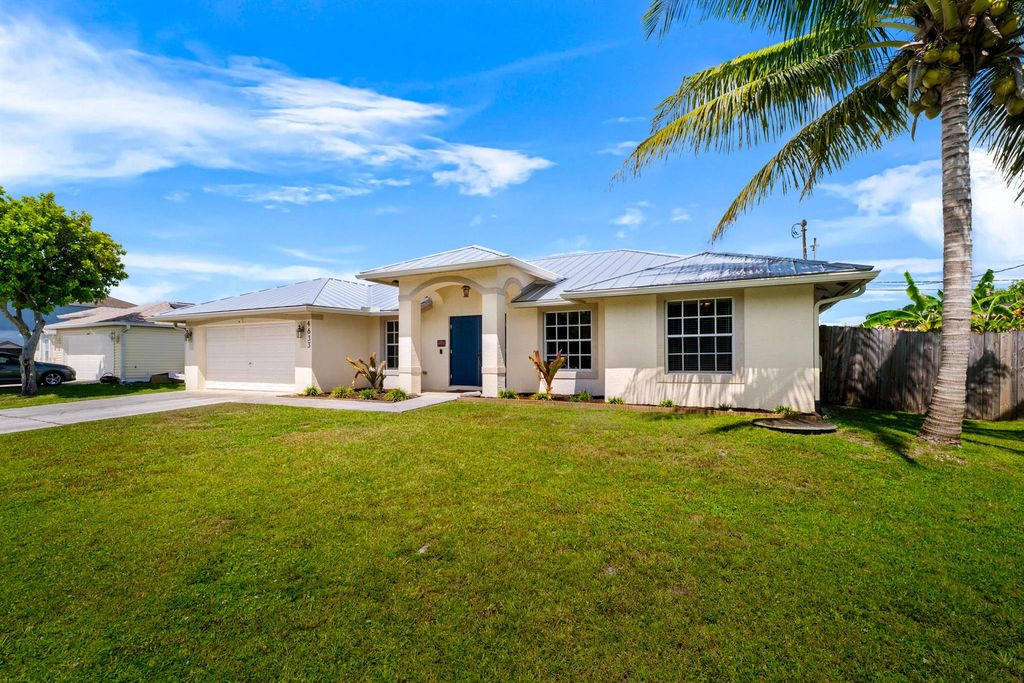 Photo of 4633 SW Ulster Street, Port Saint Lucie, FL 34953 (MLS # R11112743)