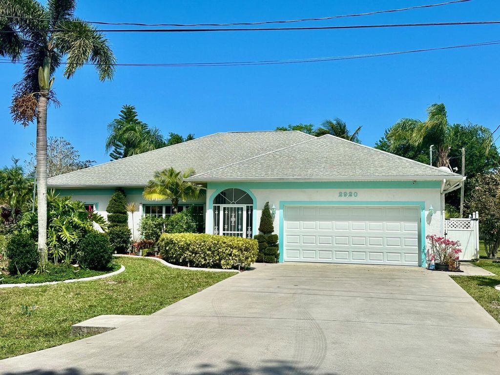 Photo of 2920 SE Buccaneer Circle, Port Saint Lucie, FL 34952 (MLS # R11072855)