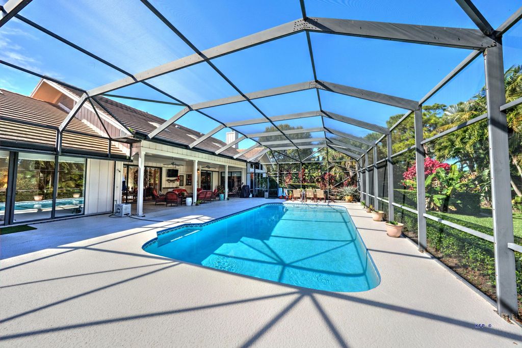 Photo of 6071 SE Medinah Lane, Stuart, FL 34997 (MLS # R10786989)