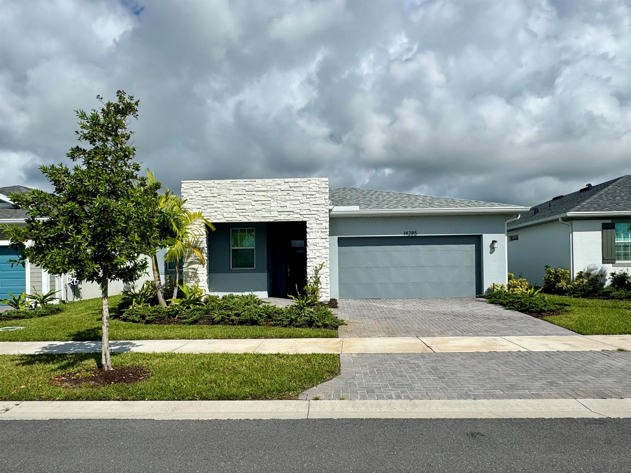 Never lived in 3 bedroom plus den family home in the highly sought after Tradition community - Cadence. This well designed home welcomes you through the gorgeous foyer into an open floorplan with the spacious kitchen, island with breakfast nook and Great Room are at the center of attention. The two secondary bedrooms share a hall bath. The flex room can be used as a game room, office or play room along with the laundry room, both conveniently located nearby. The owner's suite with  a private bath and a spacious walk-in closet. Cadence is conveniently located close to schools, park, Tradition square, the Heart and I95.