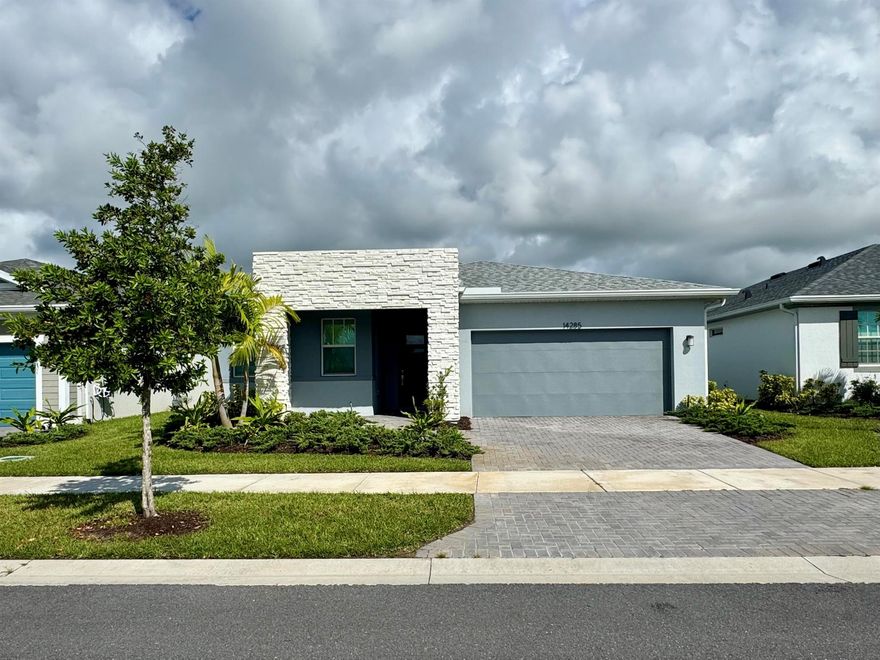 Never lived in 3 bedroom plus den family home in the highly sought after Tradition community - Cadence. This well designed home welcomes you through the gorgeous foyer into an open floorplan with the spacious kitchen, island with breakfast nook and Great Room are at the center of attention. The two secondary bedrooms share a hall bath. The flex room can be used as a game room, office or play room along with the laundry room, both conveniently located nearby. The owner's suite with  a private bath and a spacious walk-in closet. Cadence is conveniently located close to schools, park, Tradition square, the Heart and I95.