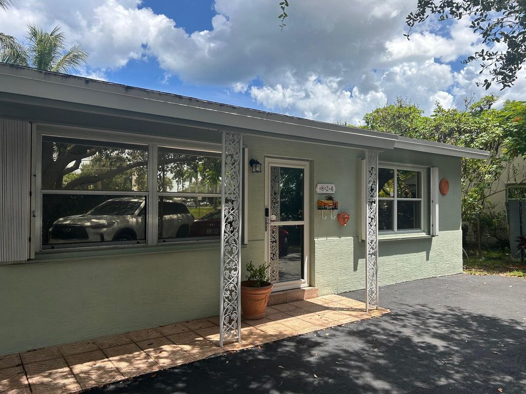 Photo of 824 Prosperity Farms Road, North Palm Beach, FL 33408 (MLS # R11117583)