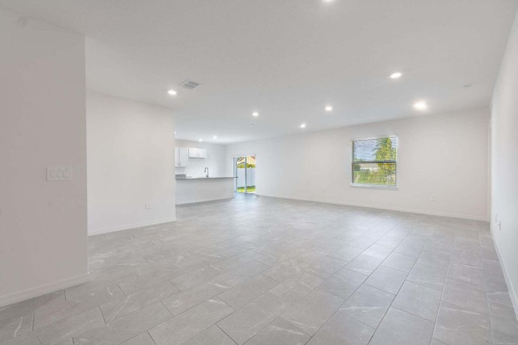 Photo of 1457 SW Malaga Avenue, Port Saint Lucie, FL 34953 (MLS # R10961405)