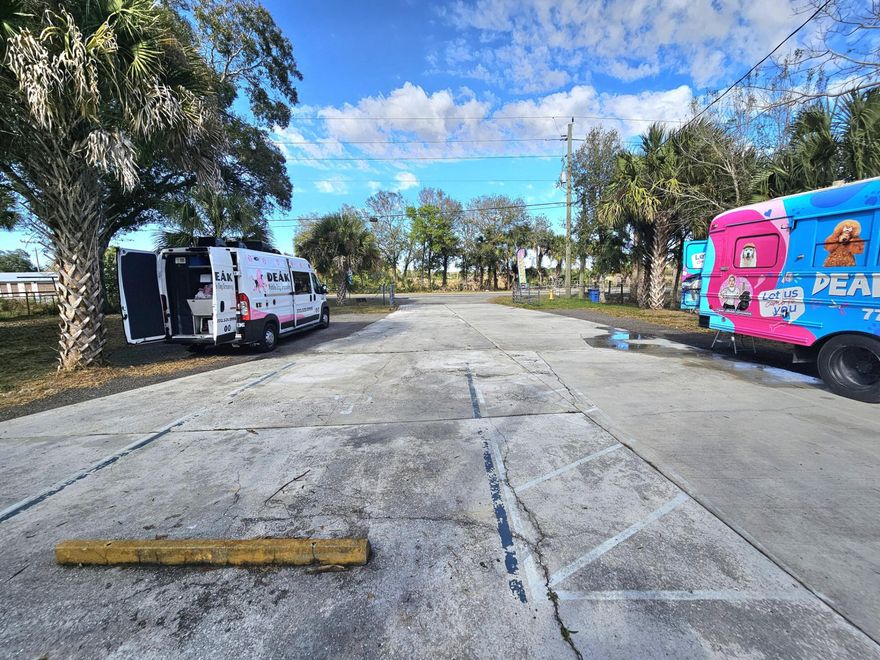 Excellent Commercial Opportunity! Prime NC-2 zoned lot and ready for business. 101' frontage along State Road 70, a highly traveled highway spanning Florida from coast to coast. High and dry lot with electric, septic tank, water well already on site and city water available. Features a concreted entrance, beautiful landscaping, and is fully fenced. Excellent in-town location with easy access and commute, offering great visibility and convenience. Ideal for a business on wheels or small commercial use. Bring your food truck, ice cream or dessert shop, coffee trailer, auto detailing business, fitness or martial arts studio, pet grooming, and more. Endless possibilities on this well-prepared and attractive parcel. perfect for entrepreneurs looking for a turnkey setup in a prime location. Call before it is gone.