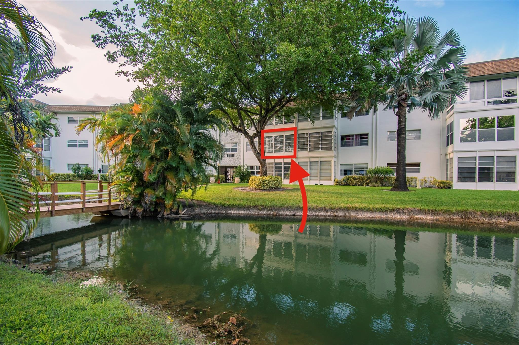 Discover your slice of paradise in this charming one-bedroom, one-bath waterfront condo. Located in the coveted Petunia Gardens building within Hawaiian Gardens, this 2nd floor unit boasts breathtaking lake views and natural daylight. The enclosed Florida room offers a versatile space perfect for a home office or bonus room. Enjoy resort-style living with lots of amenities, including 2 community pools, a clubhouse with a fitness center, billiard room, a library, and a ballroom. Stroll along the scenic walking paths and bridges that wind through the community lakes, featuring covered seating areas and barbecue grills—an entertainer's dream! Don't miss this opportunity for tranquil living in a vibrant 55+ community. HOA has enough reserves, and the proper insurance for conventional loans.