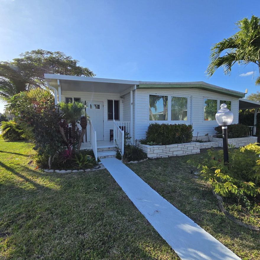 BEAUTIFUL AND SPACIOUS HOME, COMPLETELY RENOVATED WITH 2 BEDROOMS, 2 BATHS AND AN ENCLOSED FLORIDA ROOM WITH A SEPARATE ENTRANCE, THAT COULD BE A 3RD BEDROOM. HOME IS LOCATED IN DEERFIELD LAKE, A BEAUTIFUL 55+ COMMUNITY, ONLY A FEW MILES TO THE DESIRABLE BEACH OF DEERFIELD.  PERFECT FOR RETIREES.  
LOT RENTAL $1,062.71 MONTHLY.
IT CAN BE FINANCE.