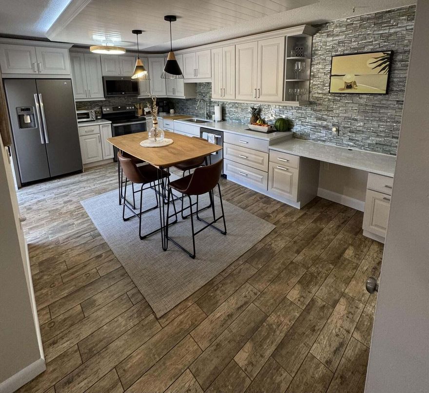 Gorgeous and fully remodeled townhome located within minutes of the Beach. The Lakes is a well sought after community. Amenities of this home are extensive. New Baths and kitchen. First class design and decorated home. Turnkey. Enjoy a fully stocked kitchen to a fully stocked day at the beach! Exterior porch offers privacy for entertaining. All new hurricane impact windows/sliders.   2 deeded parking spots. Plenty of guest space.  A must see!